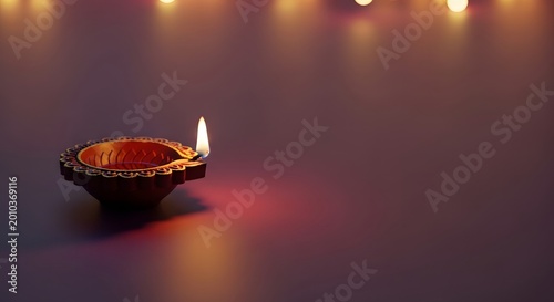 Traditional indian diya lamp on dark background.