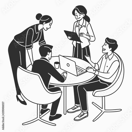 Man and woman sitting at a table working on a computer in an office setting