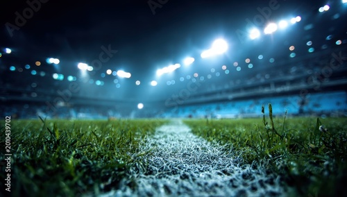 Vibrant Green Pitch Line at Night - Stadium Floodlights Illuminate Empty Football Field.