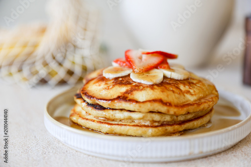 Homemade Fluffy Pancakes with Syrup, Strawberries and Banana – Aesthetic Breakfast Food Photography