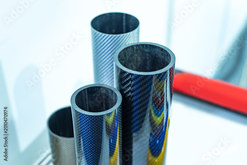 Fotografie Carbon fiber composite raw material tubes