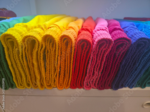 many colors male swimsuits in a folder