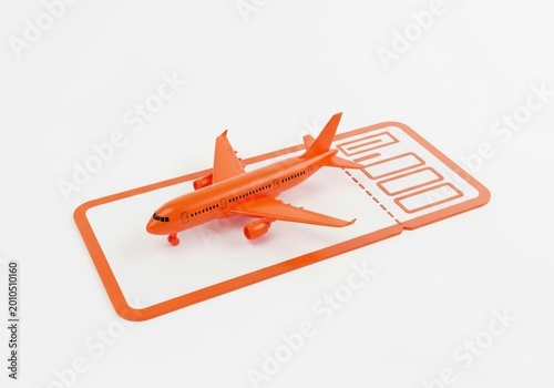 Miniature airplane model on a flat orange display stand