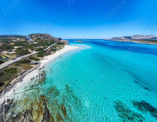 Foto Aerial View of La Pelosa Coast Under Clear Blue Sky