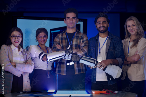 Foto diverse robotics engineering team poses in an RD lab