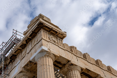 Konstfotografi A detailed view of the Parthenon's corner on the Acropolis of Athens, showing the contrast between ancient Doric architecture and modern restoration scaffolding