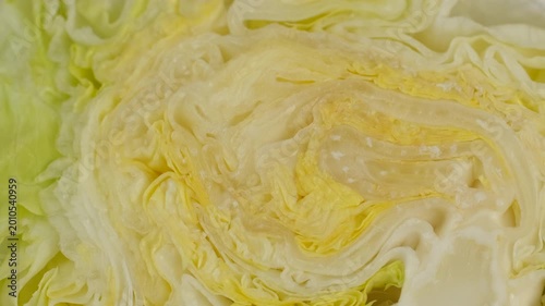 Texture cut Iceberg lettuce, rotation. Ingredient for a healthy salad
