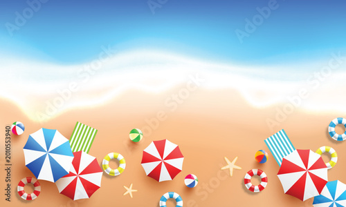 Fotografi Top view of Beach background with sea wave,colorful beach umbrella,swim ring and beach ball