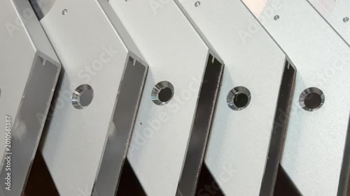 Metallic textures: aluminium profiles with a reflective surface, ideal for use in industrial design projects.