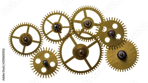 Collection of brass clockwork gears meshing together, isolated on transparent background