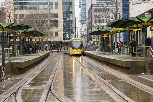 Manchester, uk, January 19th 2025 famous yellow Metrolink Tram at St Peters Square Station. Public Transport Vehicle for local services