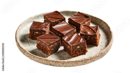 Slika na platnu Rich chocolate fudge brownies with nuts topped with glossy ganache, isolated on