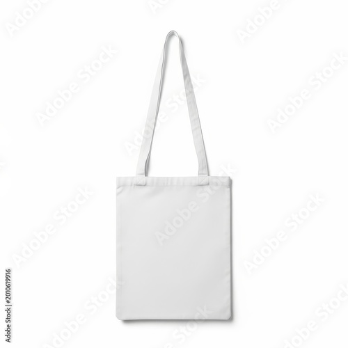Blank white canvas tote bag with long handles isolated on a clean white studio background