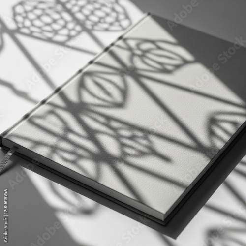 Blank white notebook mockup for journal design and creative branding, with decorative shadows