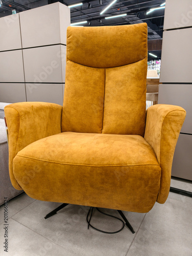 Canvastavla Bright and soft yellow armchair for ultimate comfort, available in the furniture