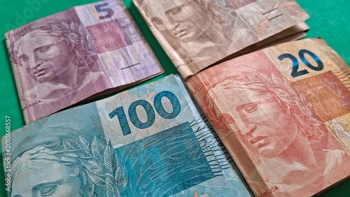 Принти на полотні Brazilian real banknotes representing various currency denominations arranged ne