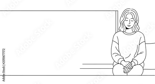 Foto A young woman sitting peacefully with her eyes closed.