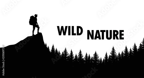 Silhouette of a hiker standing on a mountain peak overlooking a forest with wild nature text.