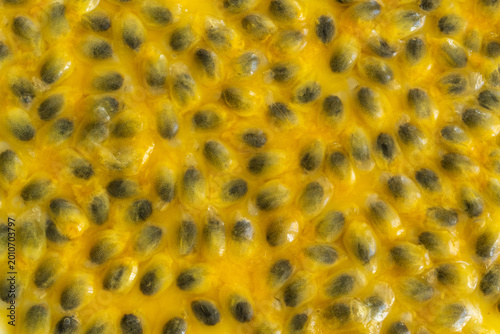 Fotografi Passion fruit seeds textured background
