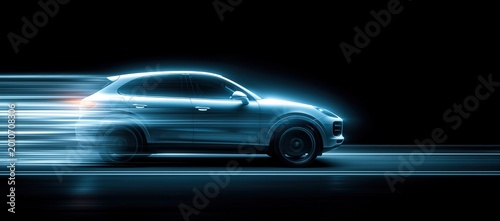 Car is shown in motion with its headlights on
