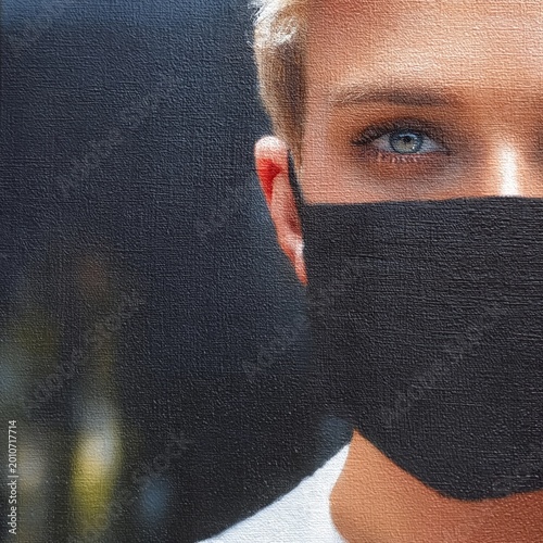 Person Wearing a Black Mask With Blue Eyes in an Indoor Setting During the Day