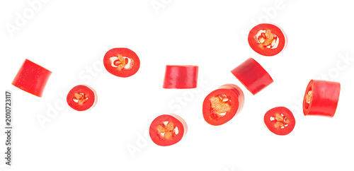Red sliced chili pepper isolated on a white background, top view. Fresh mexican hot cayenne spicy.