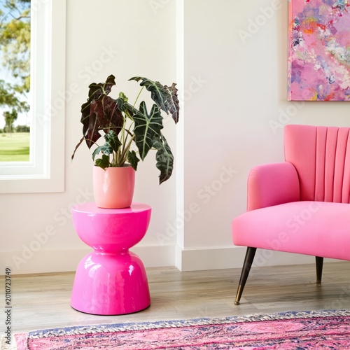 Bright Pink Chair and Table With a Plant in a Modern Living Room Setting