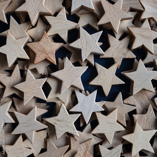 Wooden Stars Scattered on a Surface in Various Shades and Sizes