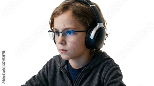 Young boy gamer or student using technology