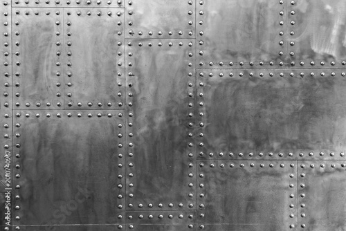 Old steel metal riveted texture as background