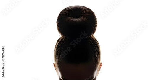 A compact high bun with a tight rounded structure and smooth finish, emphasizing a clean silhouette.