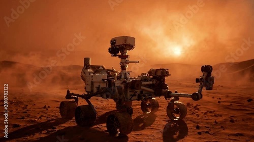 Robotic rover driving across a dusty red planet landscape beneath a glowing sun and drifting sand haze