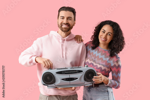 Young couple with boombox o...