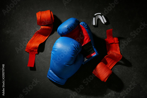 Pair of blue boxing gloves ...