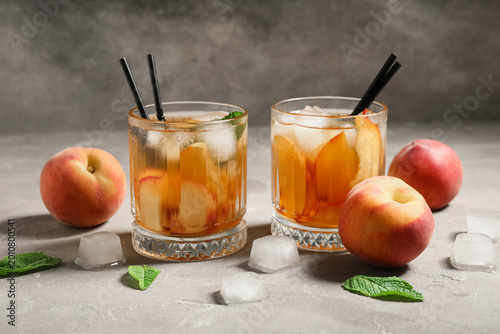Glasses of tasty peach iced...