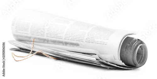 Fotografie One roll of newspaper isolated on white