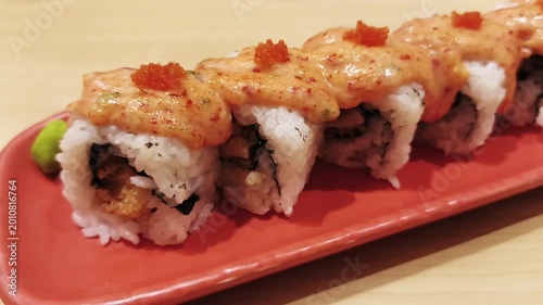 Delicious sushi rolls close up on plate, Japanese food video aesthetic