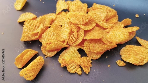 Close up potato chips snack video, crispy food texture background