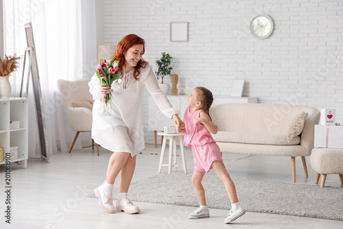 Mother and child dancing wi...