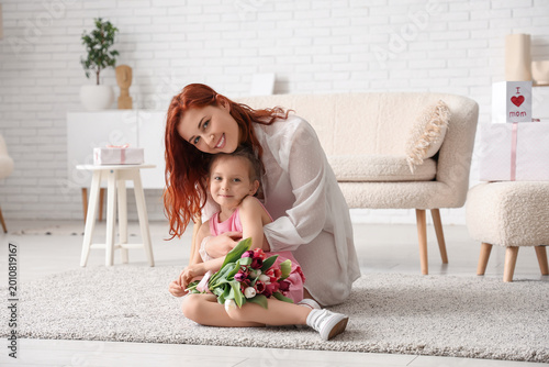 Happy mother and child with...