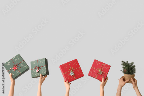 Female hands holding gift b...
