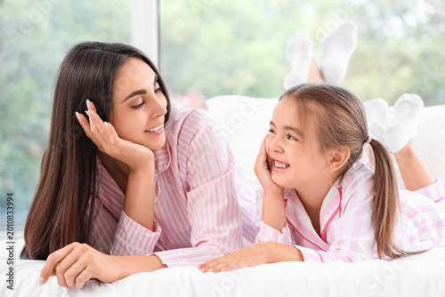 Happy mother with her littl...