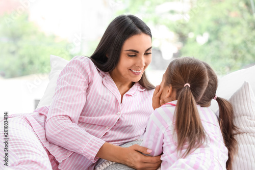 Happy mother with her littl...