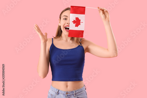 Happy young woman with flag...