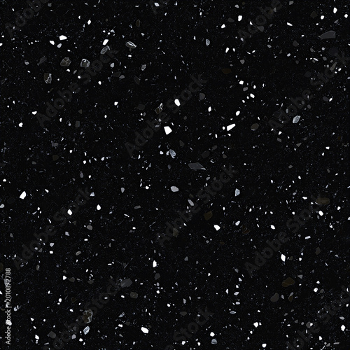 Closeup texture of black and white speckled granite surface with natural stone patterns