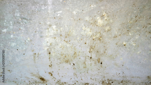 Photos Dirty, weathered concrete wall texture with stains, scratches, and speckled mark