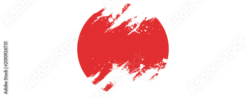 Japanese flag symbol of rising sun. Red circle in grunge style on white background.