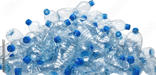 A large pile of empty clear plastic water bottles with blue caps symbolizing waste and recycling plastic bottles empty bottles environmental pollution discarded trash rubbish