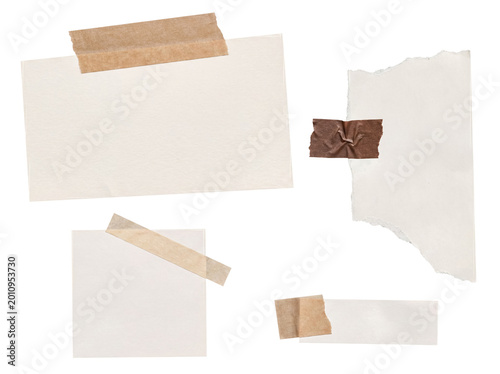 Photos Collection of various ripped paper pieces held with masking tape, creating a collage effect