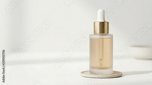 Cosmetic serum bottle on a stone coaster